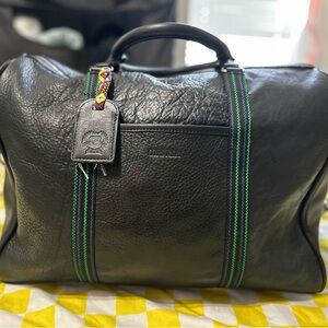 Consuela Black Duffel Bag with Green Striped Strap